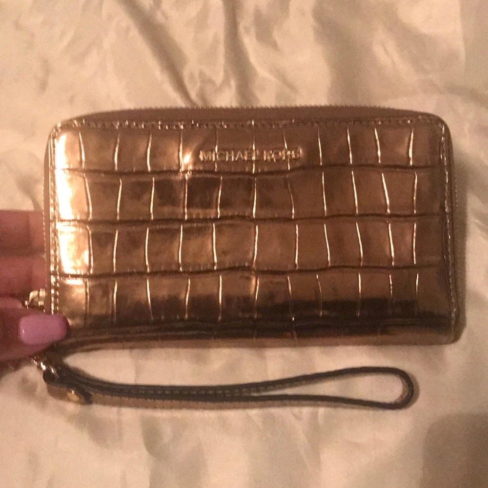 Gold Michael Kors wristlet/wallet
